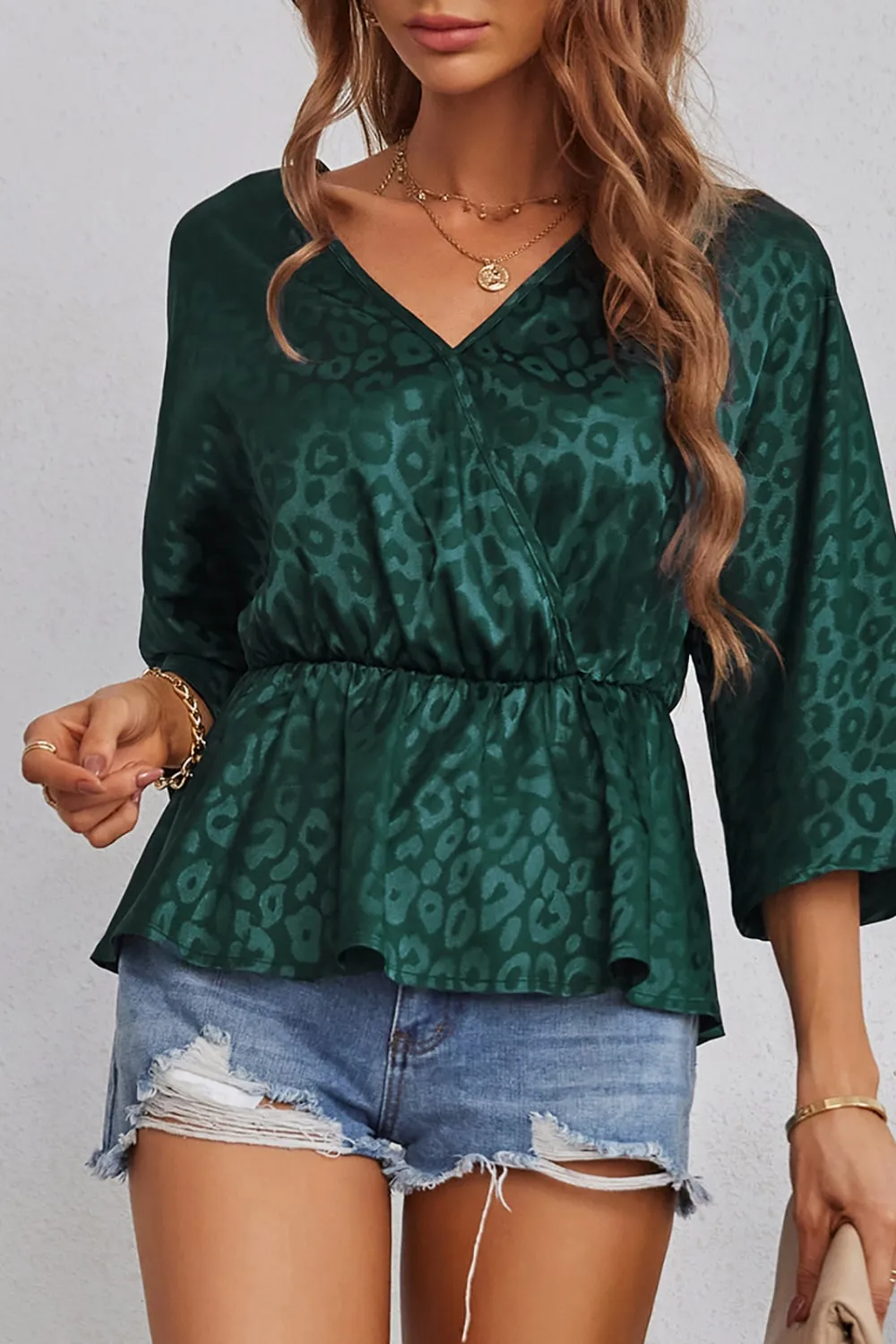 Leopard Three-Quarter Sleeve Peplum Blouse